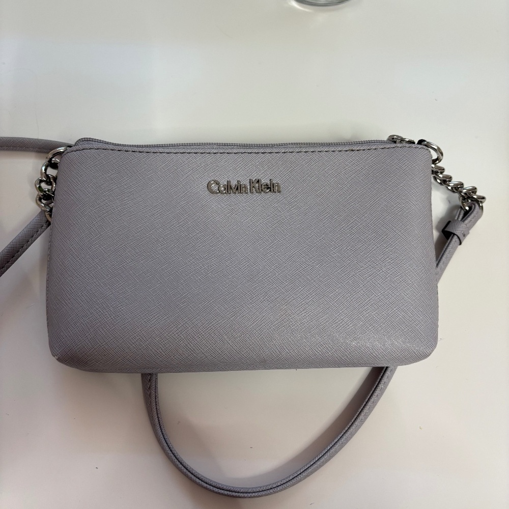 Calvin Klein small purple purse . Crossbody bag